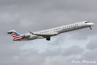 N568NN @ KSRQ - American Flight 5139 operated by PSA (N568NN) departs Sarasota-Bradenton International Airport enroute to Charlotte-Douglas International Airport - by Donten Photography