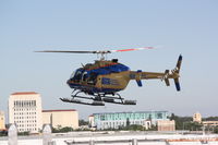 N955TG @ FA23 - Aeromed departs the helipad at Sarasota Memorial Hospital - by Donten Photography