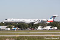 N578NN @ KSRQ - American Flight 5403 operated by PSA (N578NN) arrives at Sarasota-Bradenton International Airport following flight from Charlotte-Douglas International Airport - by Donten Photography