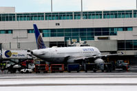 N411UA @ KDEN - Gate B20 DEN - by Ronald Barker