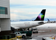 XA-VLF @ KDEN - At the gate DEN - by Ronald Barker