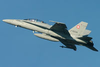 J-5234 @ LSMD - Hornet departing Dübendorf, gaining height before turning hard to avoid Airliners from Zurich Airport - by Grimmi