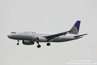 N413UA @ KSRQ - United Flight 1778 (N413UA) arrives at Sarasota-Bradenton International Airport following flight from Chicago-O'Hare International Airport - by Donten Photography