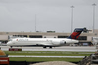 N985AT @ PBI - Taxiing for takeoff - by Bruce H. Solov