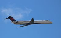 N906DE @ KMCO - MD-88