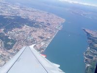 CS-TTG @ LPPT - overwing shot from leaving LPPT with most of Lisbon and surrounding areas visible, on route to EGCC