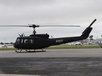 N19CF @ FPR - all black UH-1H of Robinson Air Crane at Ft Pierce - by Jack Poelstra