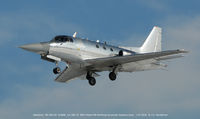 N168W @ BWI - On final over snow. - by J.G. Handelman