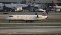 N978SW @ LAX - United Express - by Florida Metal