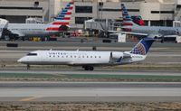 N984CA @ LAX - United Express - by Florida Metal