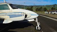 N310H @ KRHV - Locally-based 1964 Cessna 310I looking better than ever (no more flat tires!!) parked at a temporary tie down to make room for all the transient Super Bowl 50 aircraft coming to Reid Hillview Airport, San Jose, CA. - by Chris Leipelt