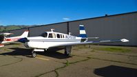 N315SB @ KRHV - Locally-based 1969 Mooney M20F looking better than ever (no more cob-web flat tires!) parked at a temporary tie down to make room for all the transient Super Bowl 50 aircraft coming to Reid Hillview Airport, San Jose, CA. - by Chris Leipelt