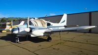 N4644P @ KRHV - Locally-based 1960 Piper Aztec looking better than ever (no flat tires!!) parked at a temporary tie down to make room for all the transient Super Bowl 50 aircraft coming to Reid Hillview Airport, San Jose, CA. - by Chris Leipelt