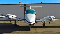 N176BC @ KRHV - Locally-based 1979 Beechcraft Duchess looking better than ever (with no flat tires, but it still doesn't look right...) parked at a temporary tie down to make room for all the transient Super Bowl 50 aircraft coming to Reid Hillview Airport, San Jose, CA. - by Chris Leipelt