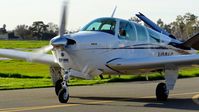 N20AC @ KRHV - Locally-based 1972 Beechcraft V35B Bonanza taxing to its hangar after landing at Reid Hillview Airport, San Jose, CA. - by Chris Leipelt