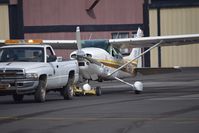 N2170M @ KPAO - N2170M being towed to the ramp following an emergency landing due to a front gear flat tire. - by adenhart