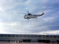 12422 - Shown hovering over the parade square at Canadian Forces Base Cornwallis, Nova Scotia, Canada in 1971. - by Alf Adams