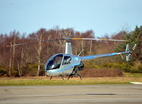 G-OAVA @ EGLK - Robinson R22 Beta at Blackbushe. - by moxy