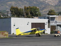 N2285C @ SZP - 1953 Cessna 180, Continental O-470 230 Hp, refueling with aircraft parked facing strong gusty Santana wind - by Doug Robertson