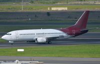 TN-MAN @ FAJS - TAC B733 arriving in JNB for maintanance. Air Madagascar logo is still visible on the engine. - by FerryPNL