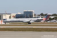 N552NN @ KSRQ - American Flight 5403 operated by PSA (N552NN) arrives at Sarasota-Bradenton International Airport following flight from Charlotte-Douglas International Airport - by Donten Photography