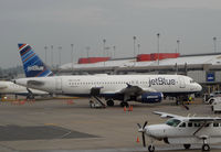 N597JB @ PIT - @ gate @ PIT