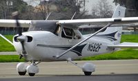N562F @ KRHV - Northern California-based 2004 Cessna 172S taxing to the transient ramp after some self serve fuel at Reid Hillview Airport, San Jose, CA. - by Chris Leipelt