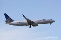 N14235 @ KSRQ - United Flight 1886 (N14235) arrives at Sarasota-Bradenton International Airport following flight from Newark-Liberty International Airport - by Donten Photography