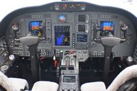N99AG @ KOAK - Flight deck of N99AG. Aircraft is currently listed for sale. - by adenhart