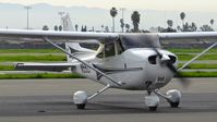N562F @ KRHV - Northern California-based 2004 Cessna 172S taxing out for departure at Reid Hillview Airport, San Jose, CA. - by Chris Leipelt