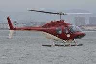 ZS-RFE @ FACT - Bell 206 returning from a sight seeing flight at V&A Waterfront Heliport - by FerryPNL