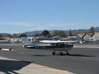 N4711B @ SZP - 1979 Cessna 152, Lycoming O-235 115 Hp, holding short Rwy 22 on WRONG side of runway. In my 49 years here, that's a first! Faced that way, 22's pattern is behind the aircraft. Note taildragger taxi approach on proper side of 22. - by Doug Robertson