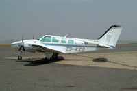 ZS-KZG @ FAGM - Beech 58 Baron [TH-1234] Johannesburg-Rand~ZS 07/10/2003 - by Ray Barber