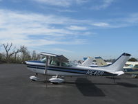 N54GR @ SZP - 1969 Cessna 182M SKYLANE, Continental O-470 230 Hp, this tiedown area slopes upward toward the river. - by Doug Robertson