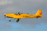 G-BWXJ @ EGSH - Landing at Norwich. - by Graham Reeve
