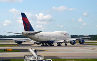 N675NW @ KATL - Taxi for takeoff Atlanta - by Ronald Barker