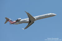 N572NN @ KSRQ - American Flight 5139 operated by PSA (N572NN) departs Sarasota-Bradenton International Airport enroute to Charlotte-Douglas International Airport - by Donten Photography