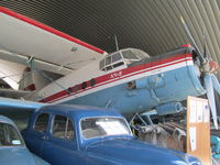 LY-AKH @ NZWF - among loads of old cars at museum - by magnaman