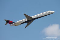 N928DL @ KSRQ - Delta Flight 2298 (N928DL) departs Sarasota-Bradenton International Airport enroute to Hartsfield-Jackson Atlanta International Airport - by Donten Photography