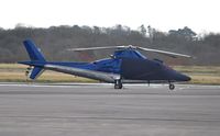 N74PM @ EGFH - Visiting sleek A-109C helicopter. - by Roger Winser