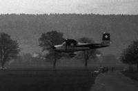 HB-CMC @ LSZG - Landing runway 07 on a winter evening. Original paint scheme. Scanned from b/w negative. - by sparrow9