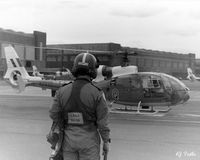 XZ930 @ EGOS - Student pilot heads out to XZ930 whilst coded 'Q' of RAF 2 FTS based at RAF Shawbury EGOS. Photographer was a pax for a 1 hour navex around the Welsh mountains. - by Clive Pattle