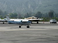 N704JH @ SZP - 1976 Cessna 150, Continental O-200 100 Hp, landing roll Rwy 22 - by Doug Robertson