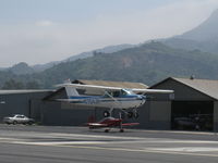 N704JH @ SZP - 1976 Cessna 150M, Continental O-200 100 Hp,  landing Rwy 22 with N406P taxiing below and beyond-A TWOFER! - by Doug Robertson