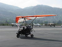 N127WP @ SZP - 2006 North Wing Design APACHE ST weight-shift control Experimental class trike, Rotax 582UL-99 64 Hp pusher, two-place, has BRS Ballistic Recovery System, taxi to Rwy 22 from hangar - by Doug Robertson