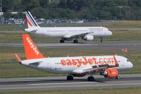 G-EZWH @ LFBO - Airbus A320-214, Landing rwy 14R, Toulouse-Blagnac airport (LFBO-TLS) - by Yves-Q