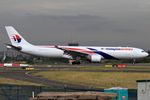9M-MTM @ YSSY - taxi from 34L - by Bill Mallinson