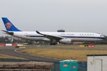 B-6502 @ YSSY - taxiing from 34L - by Bill Mallinson