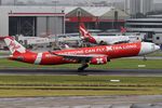 9M-XXU @ YSSY - onto a wet 16R - by Bill Mallinson