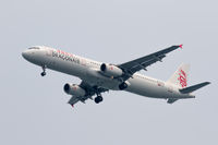B-HTG @ VHHH - On finals for Hong Kong, inbound from Shanghai Pudong Int'l - by alanh